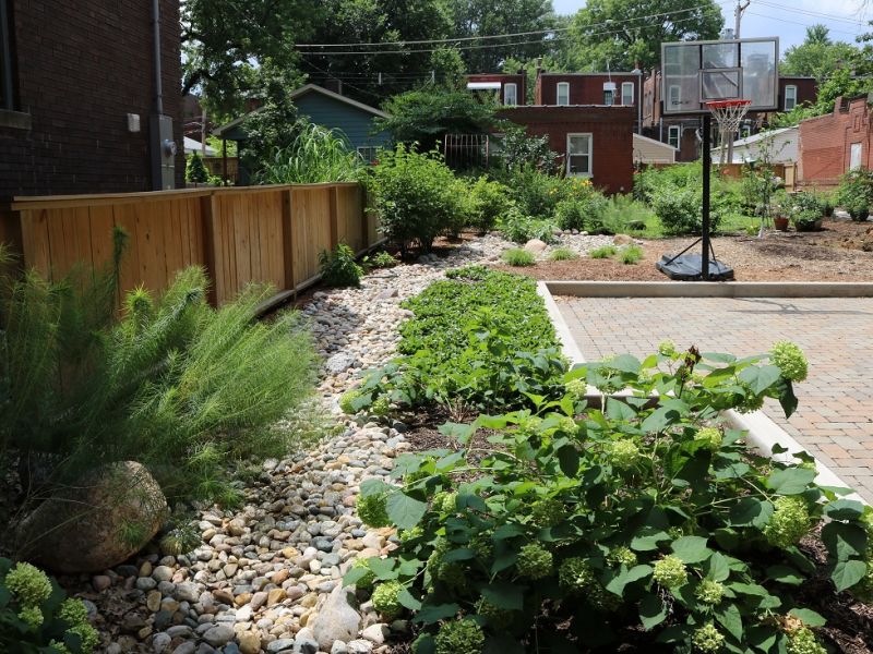 Permeable Pavers With Rain Garden